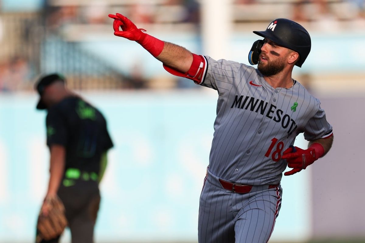 May 27, 2025; Tampa, Florida, USA; Minnesota Twins second baseman Kody Clemens (18) runs the bases after hitting a home run against the Tampa Bay Rays in the second inning at George M. Steinbrenner Field. Mandatory Credit: Nathan Ray Seebeck-Imagn Images