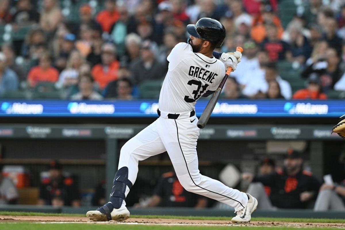 May 27, 2025; Detroit, Michigan, USA;  Detroit Tigers left fielder Riley Greene (31) hits an RBI double against the San Francisco Giants in the first inning at Comerica Park. Mandatory Credit: Lon Horwedel-Imagn Images