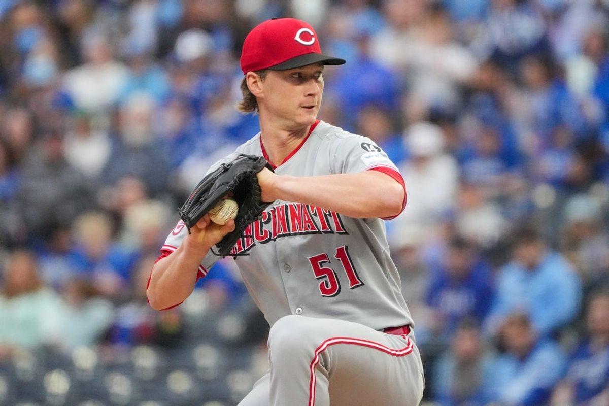 May 27, 2025; Kansas City, Missouri, USA; Cincinnati Reds starting pitcher Brady Singer (51) delivers a pitch against the Kansas City Royals during the first inning at Kauffman Stadium. Mandatory Credit: Denny Medley-Imagn Images