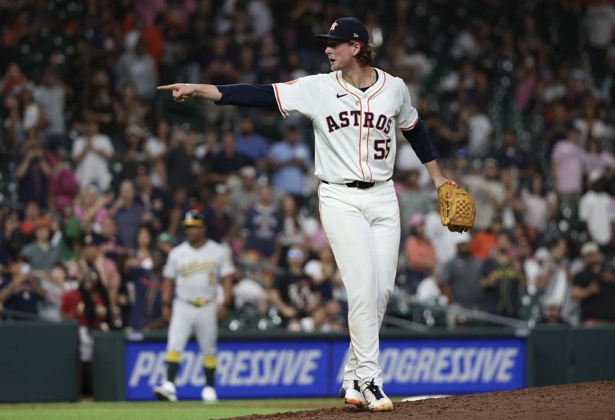 May 27, 2025; Houston, Texas, USA; Houston Astros relief pitcher Forrest Whitley (55) reacts after defeating the Athletics at Daikin Park. Mandatory Credit: Thomas Shea-Imagn Images