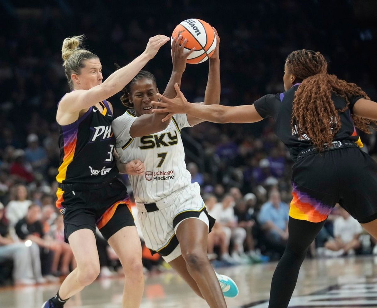Chicago Sky guard Ariel Atkins (7) is defended by Phoenix Mercury guards Sami Whitcomb (33) and Monique Akoa Makani (8) during the first quarter at PHX Arena in Phoenix, on May 27, 2025.
