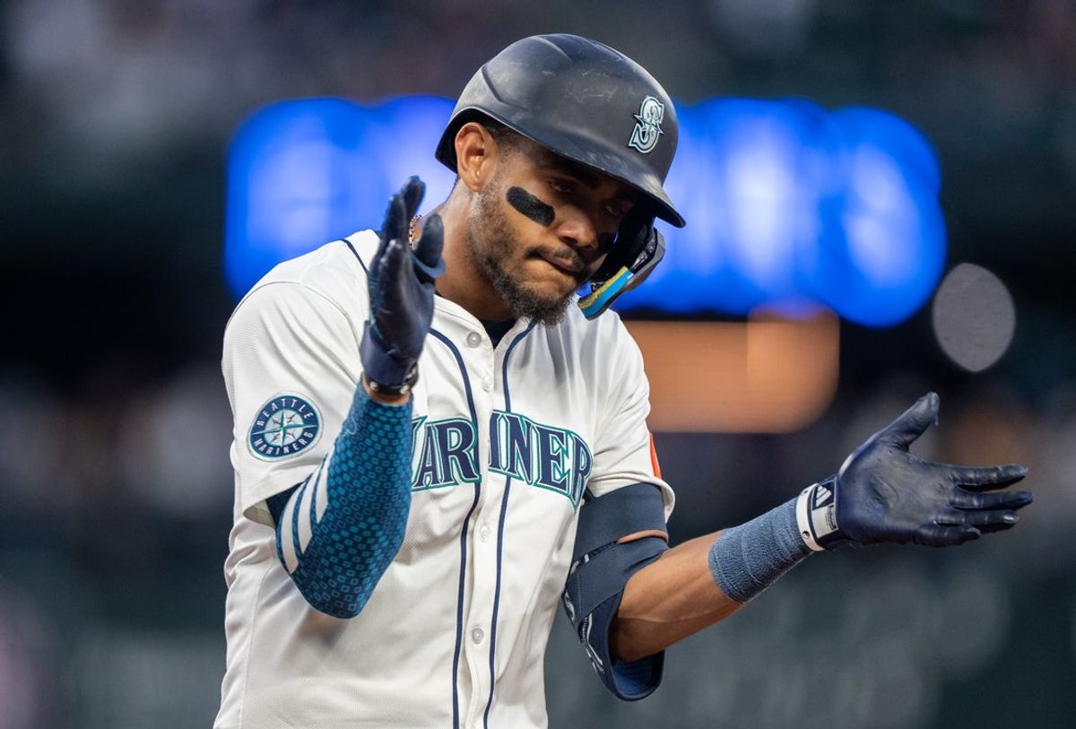 May 27, 2025; Seattle, Washington, USA;  Seattle Mariners centerfielder Julio Rodriguez (44) celebrates after hitting a single during the eighth inning against the Washington Nationals at T-Mobile Park. Mandatory Credit: Stephen Brashear-Imagn Images