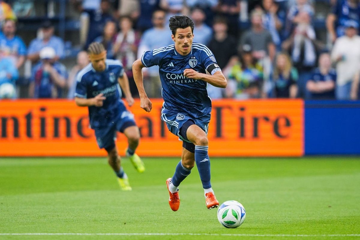 May 24, 2025; Kansas City, Kansas, USA; Sporting Kansas City forward Daniel Salloi (10) controls the ball during the first half against the New England Revolution at Children's Mercy Park. Mandatory Credit: Jay Biggerstaff-Imagn Images