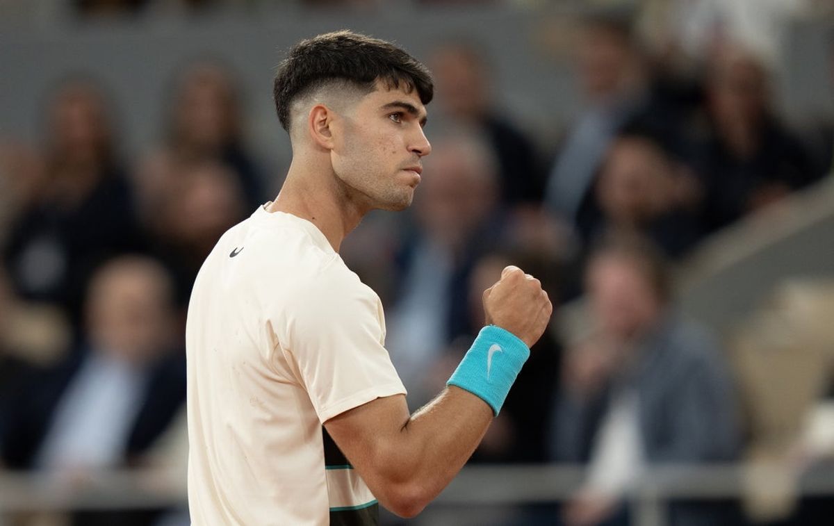 May 28, 2025; Paris, FR; Carlos Alcaraz of Spain reacts to a point during his match against Fabian Marozsan of Hungary on day four at Roland Garros Stadium.  Mandatory Credit: Susan Mullane-Imagn Images