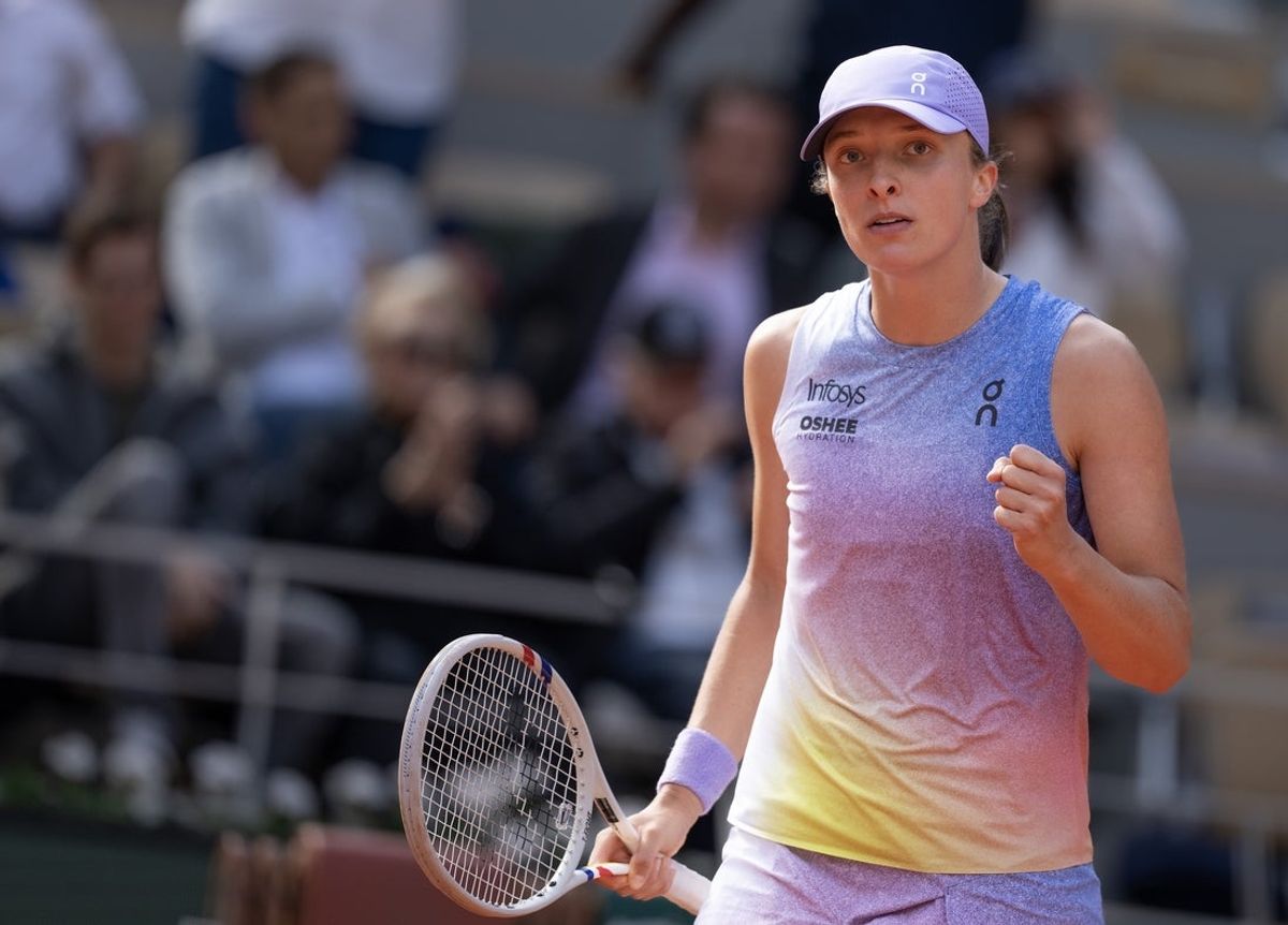 May 28, 2025; Paris, FR; Iga Swiatek of Poland celebrates winning her match against Emma Raducanu of Great Britain on day four at Roland Garros Stadium.  Mandatory Credit: Susan Mullane-Imagn Images