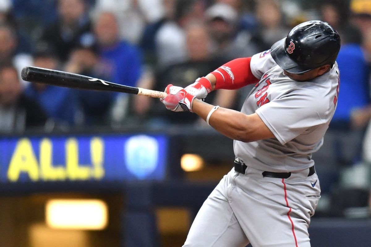 May 28, 2025; Milwaukee, Wisconsin, USA; Boston Red Sox designated hitter Rafael Devers (11) hits a two run single during the fourth inning against the Milwaukee Brewers at American Family Field. Mandatory Credit: Patrick Gorski-Imagn Images