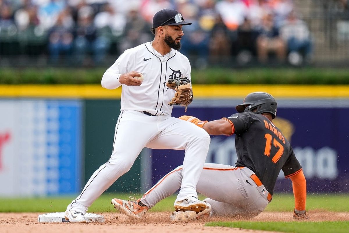 Detroit Tigers second baseman Gleyber Torres (25) tags out San Francisco Giants left fielder Heliot Ramos (17) during the sixth inning at Comerica Park in Detroit on Wednesday, May 28, 2025.