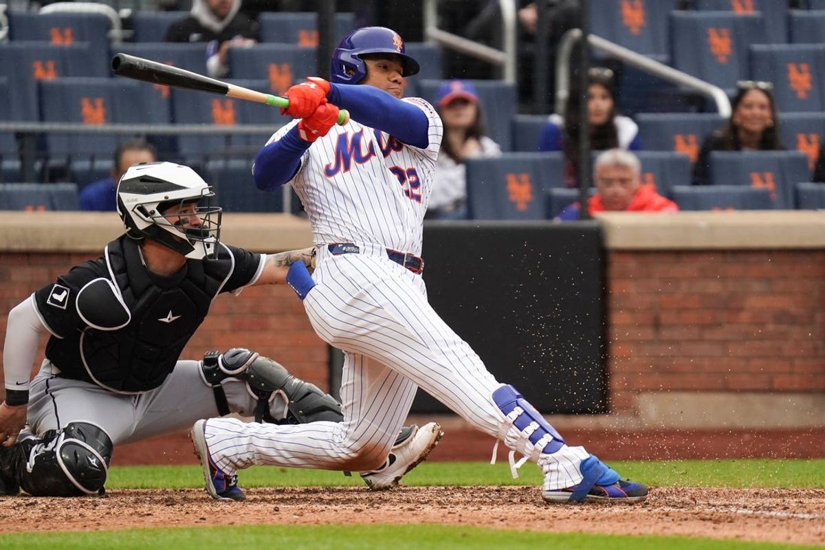 May 28, 2025; New York, New York, USA; New York Mets right fielder Juan Soto (22) grounds out during the game against the Chicago White Sox at Citi Field. Mandatory Credit: Lucas Boland-Imagn Images