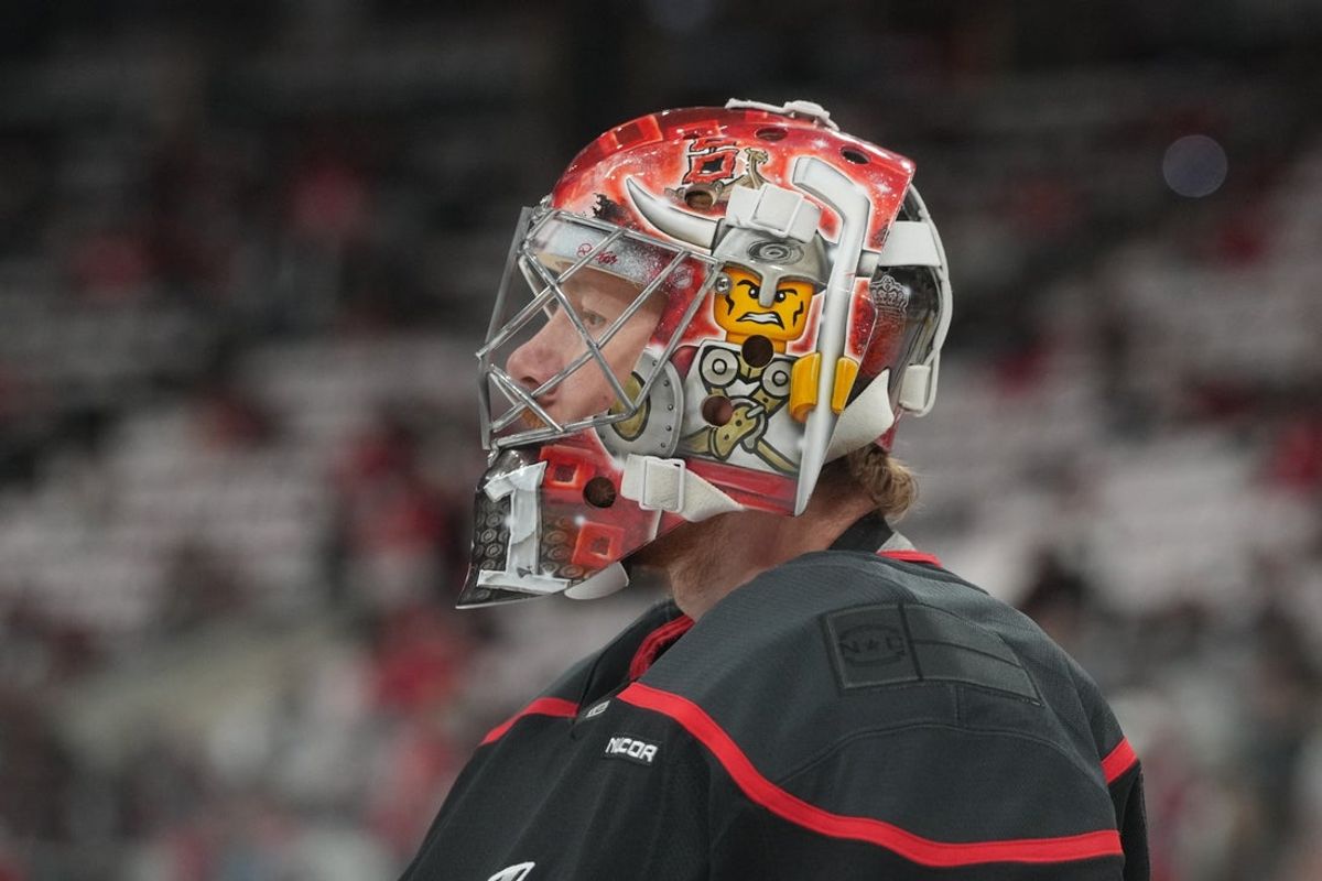 May 28, 2025; Raleigh, North Carolina, USA; Carolina Hurricanes goaltender Pyotr Kochetkov (52) warms up prior to the game against the Florida Panthers in game five of the Eastern Conference Final of the 2025 Stanley Cup Playoffs at Lenovo Center. Mandatory Credit: James Guillory-Imagn Images