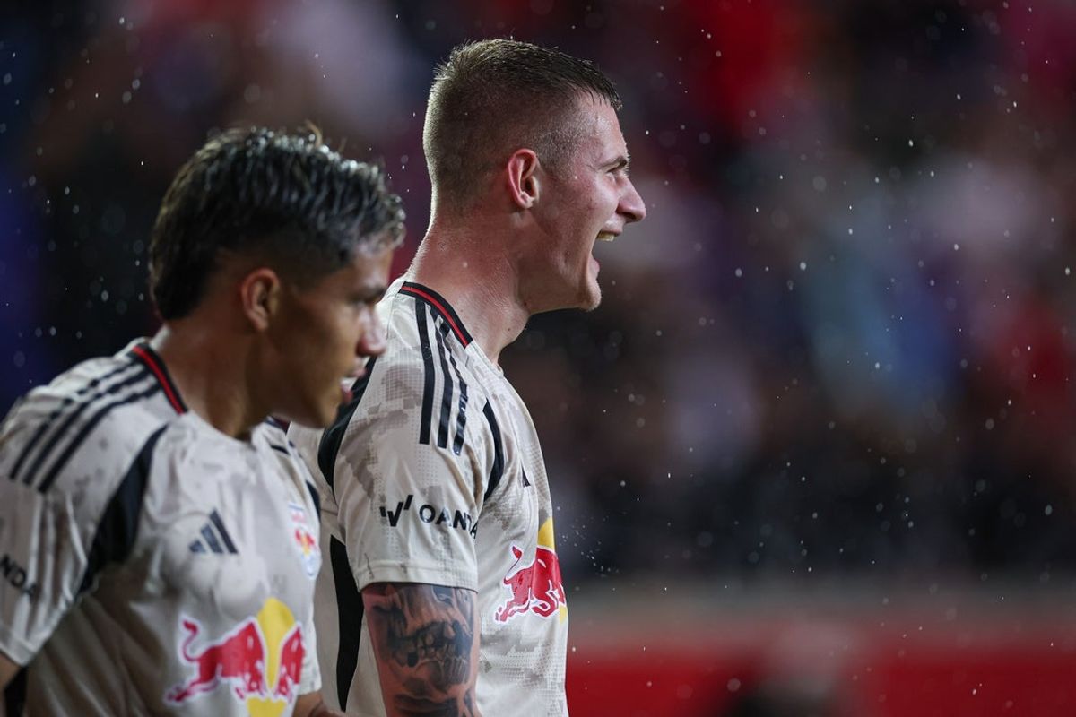 May 28, 2025; Harrison, New Jersey, USA; New York Red Bulls forward Wiktor Bogacz (7) reacts after scoring a goal during the first half against Charlotte FC at Sports Illustrated Stadium. Mandatory Credit: Vincent Carchietta-Imagn Images