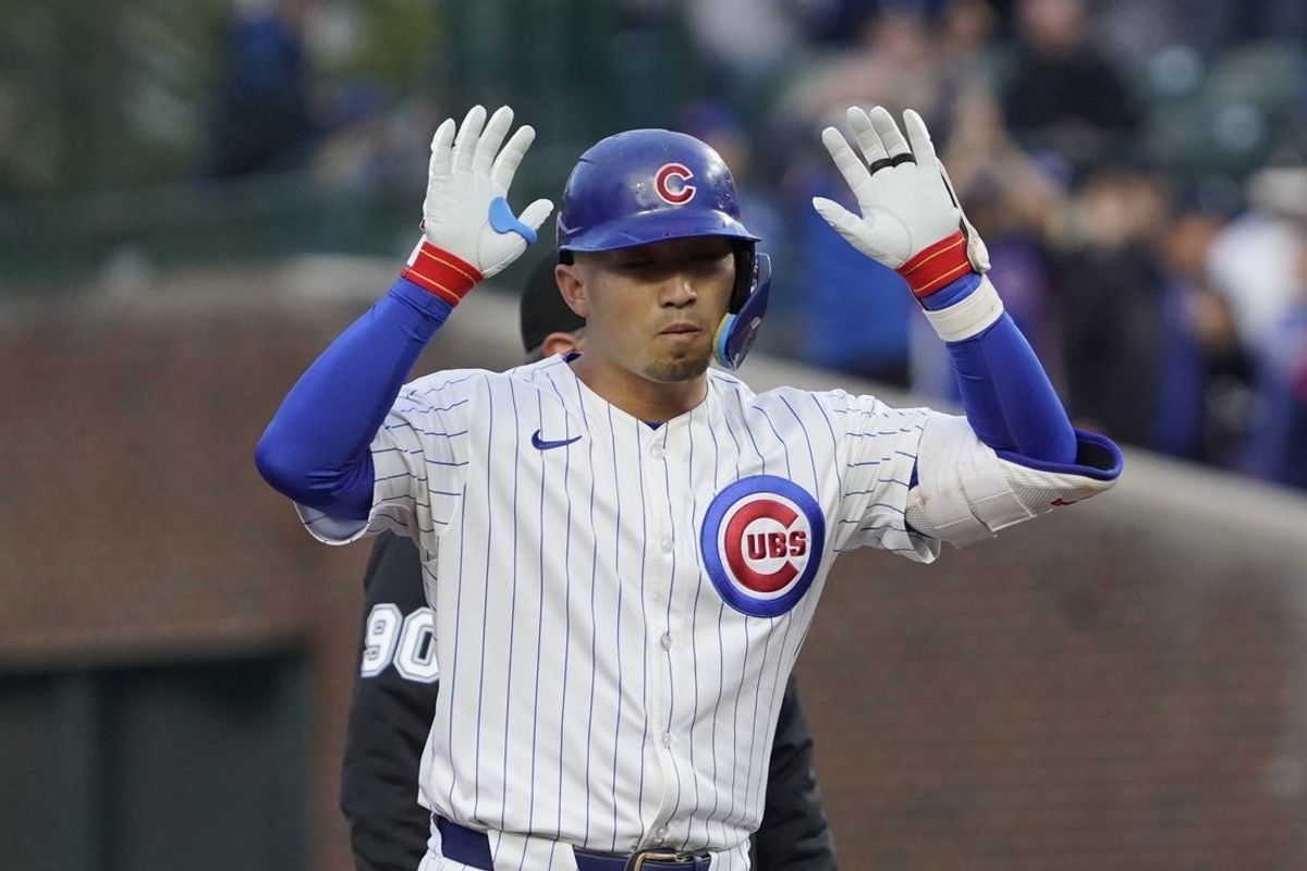 May 28, 2025; Chicago, Illinois, USA; Chicago Cubs outfielder Seiya Suzuki (27) gestures after hitting a one-run double against the Colorado Rockies during the first inning at Wrigley Field. Mandatory Credit: David Banks-Imagn Images