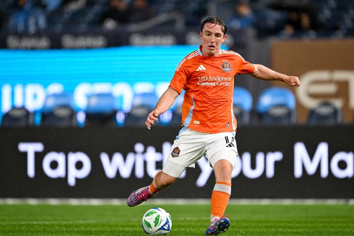 May 28, 2025; New York, New York, USA; Houston Dynamo forward Gabriel Segal (17) shoots the ball during the first half against New York City FC at Yankee Stadium. Mandatory Credit: Mark Smith-Imagn Images