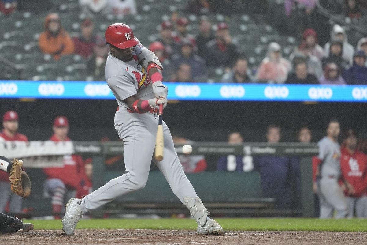 May 28, 2025; Baltimore, Maryland, USA; St. Louis Cardinals right fielder Jordan Walker (18) hits an RBI single against the Baltimore Orioles during the fourth inning at Oriole Park at Camden Yards. Mandatory Credit: Gregory Fisher-Imagn Images