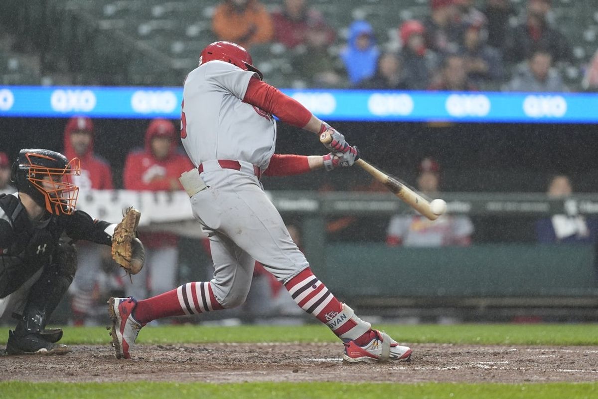May 28, 2025; Baltimore, Maryland, USA; St. Louis Cardinals second baseman Brendan Donovan (33) hits a single against the St. Louis Cardinals during the fourth inning at Oriole Park at Camden Yards. Mandatory Credit: Gregory Fisher-Imagn Images