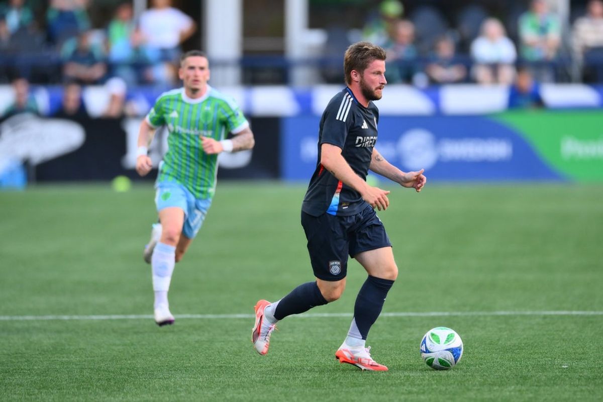 May 28, 2025; Seattle, Washington, USA; San Diego FC midfielder Anders Dreyer (10) plays the ball during the first half against Seattle Sounders FC at Lumen Field. Mandatory Credit: Steven Bisig-Imagn Images