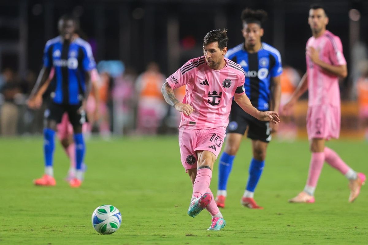 May 28, 2025; Fort Lauderdale, Florida, USA; Inter Miami CF forward Lionel Messi (10) passes the ball against CF Montreal during the second half at Chase Stadium. Mandatory Credit: Sam Navarro-Imagn Images
