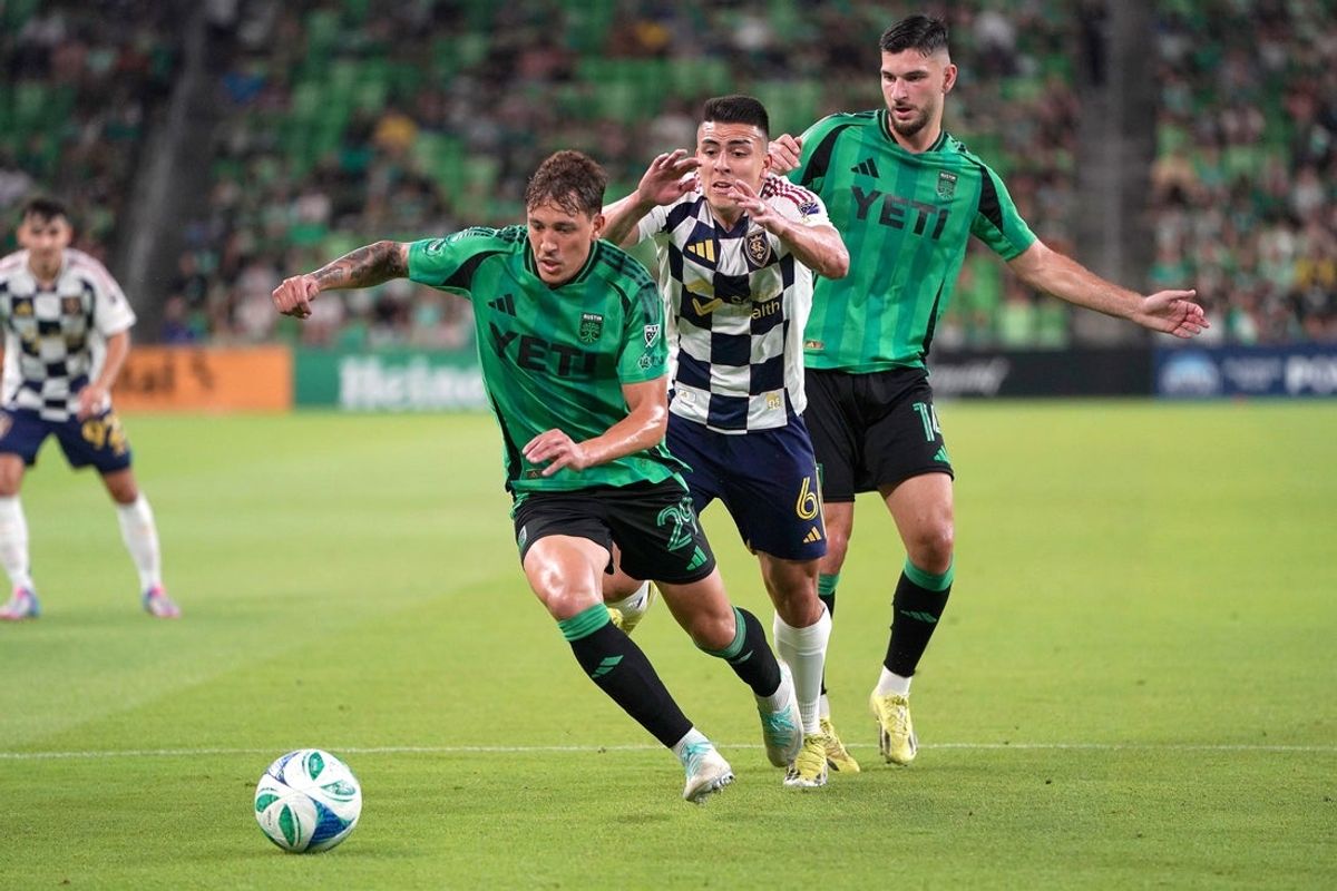 May 28, 2025; Austin, Texas, USA;  Austin FC defender Guilherme Biro (29) moves the ball against Real Salt Lake midfielder Braian Ojeda (6) during the first half at Q2 Stadium. Mandatory Credit: Dustin Safranek-Imagn Images