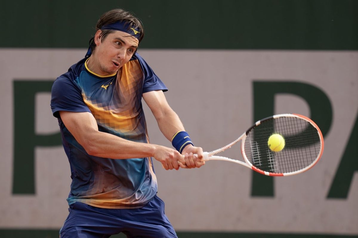 May 29, 2025; Paris, FR; Alexander Shevchenko of Kazakhstan returns a shot during his match against Ethan Quinn of the United States on day five at Roland Garros Stadium.  Mandatory Credit: Susan Mullane-Imagn Images