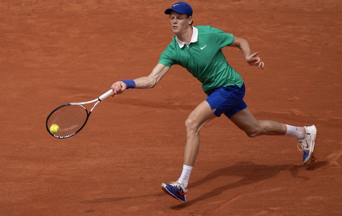 May 29, 2025; Paris, FR; Jannik Sinner of Italy returns a shot during his match against Richard Gasquet of France on day five at Roland Garros Stadium.  Mandatory Credit: Susan Mullane-Imagn Images