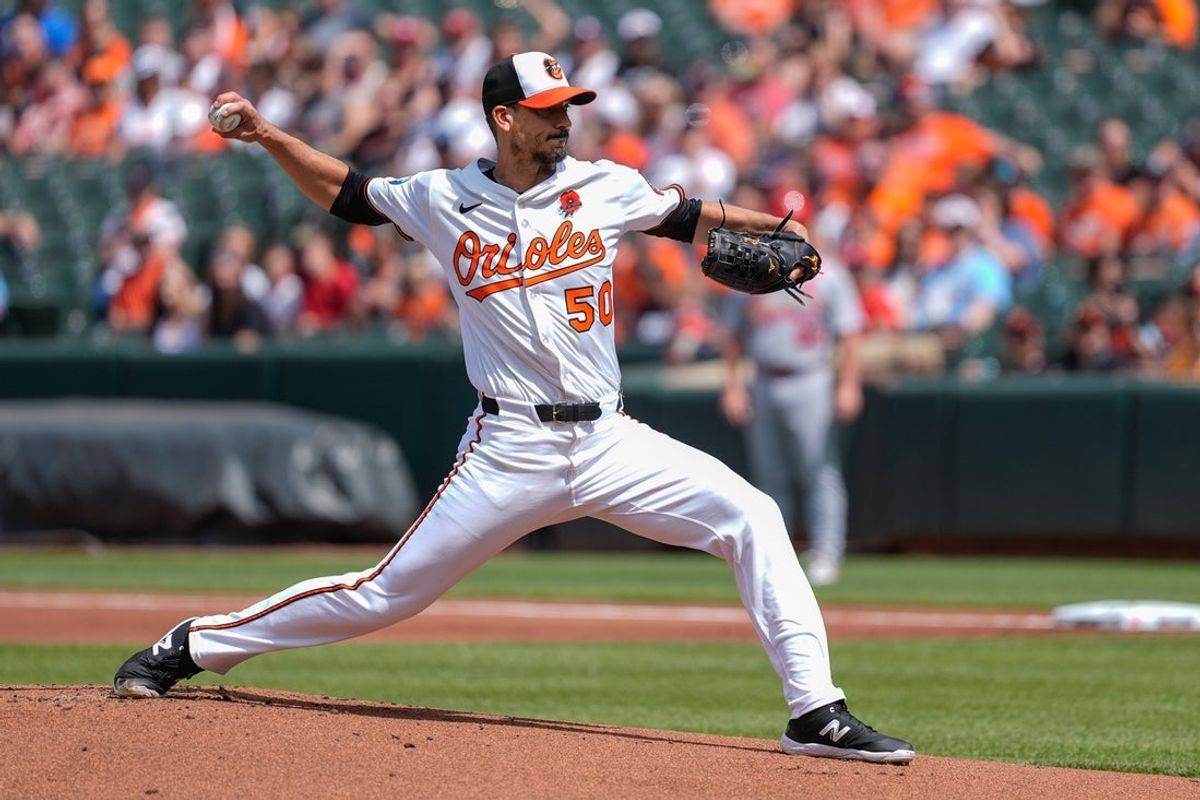 May 26, 2025; Baltimore, Maryland, USA; Baltimore Orioles pitcher Charlie Morton (50) delivers a pitch against the St. Louis Cardinals during the first inning at Oriole Park at Camden Yards. Mandatory Credit: Gregory Fisher-Imagn Images