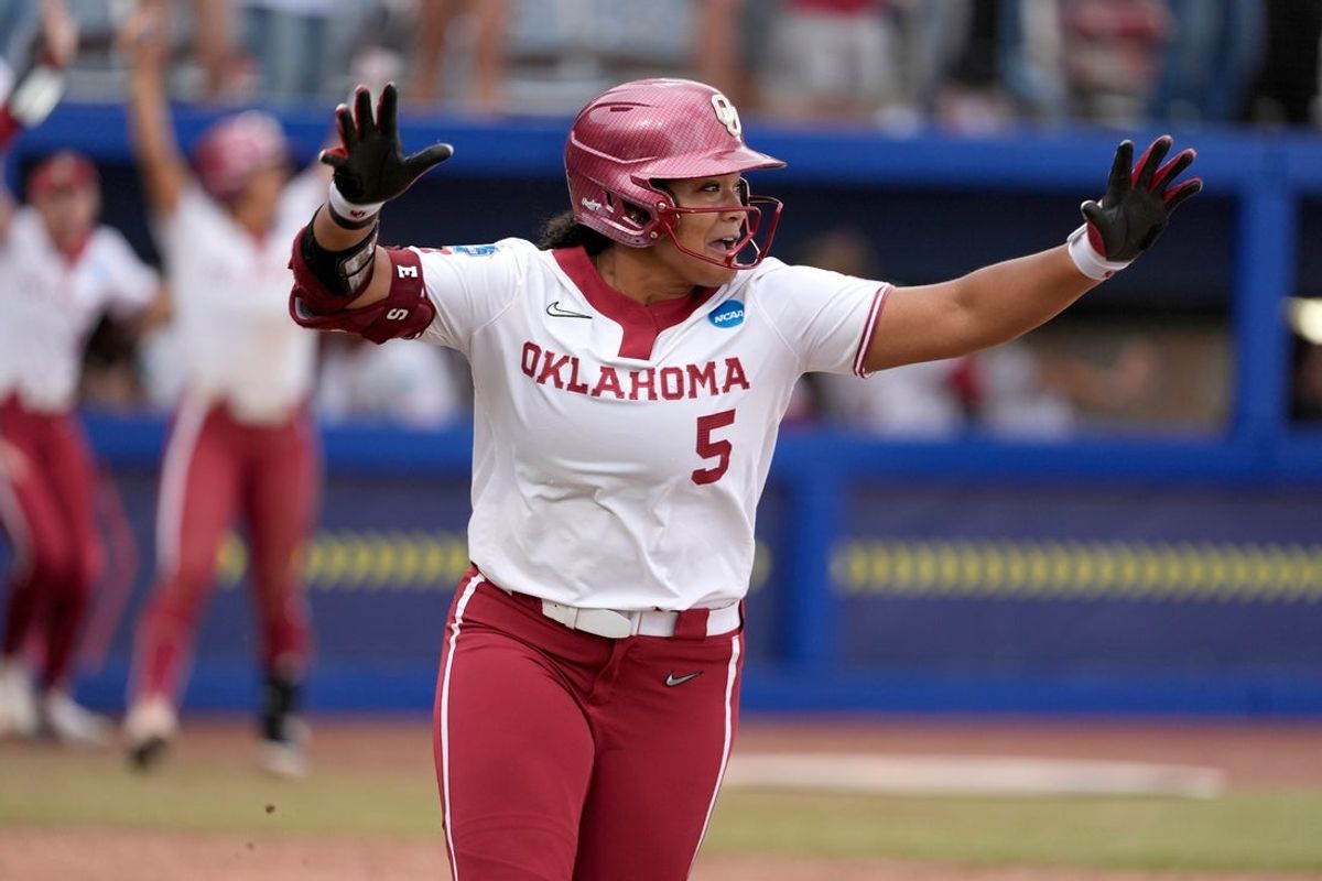 Oklahoma infielder Ella Parker (5) celebrates after hitting a walk-off home run to drive in three runs in the seventh inning of a Women's College World Series softball game between the Oklahoma Sooners (OU) and the Tennessee Volunteers at Devon Park in Oklahoma City, Thursday, May 29, 2025.