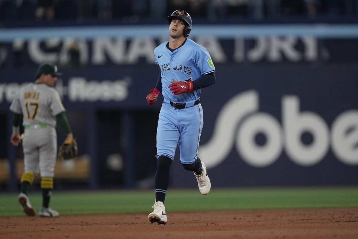 May 29, 2025; Toronto, Ontario, CAN; Toronto Blue Jays third baseman Ernie Clement (22) runs the bases after hitting a three run home run against the Athletics during the second inning at Rogers Centre. Mandatory Credit: John E. Sokolowski-Imagn Images