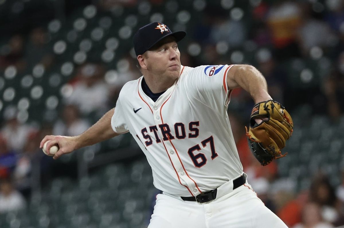 May 29, 2025; Houston, Texas, USA; Houston Astros starting pitcher Ryan Gusto (67) pitches against the Tampa Bay Rays in the first inning at Daikin Park. Mandatory Credit: Thomas Shea-Imagn Images
