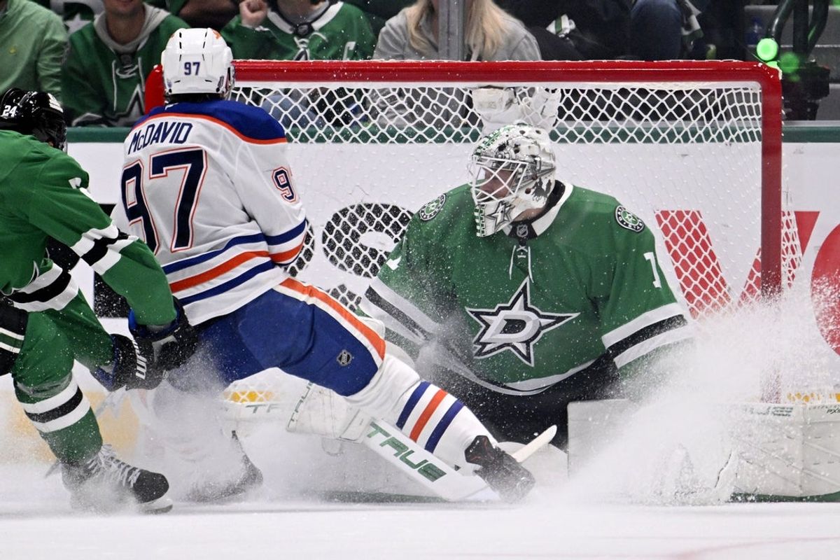 May 29, 2025; Dallas, Texas, USA; Edmonton Oilers center Connor McDavid (97) scores a goal against Dallas Stars goaltender Casey DeSmith (1) during the second period in game five of the Western Conference Final of the 2025 Stanley Cup Playoffs at American Airlines Center. Mandatory Credit: Jerome Miron-Imagn Images