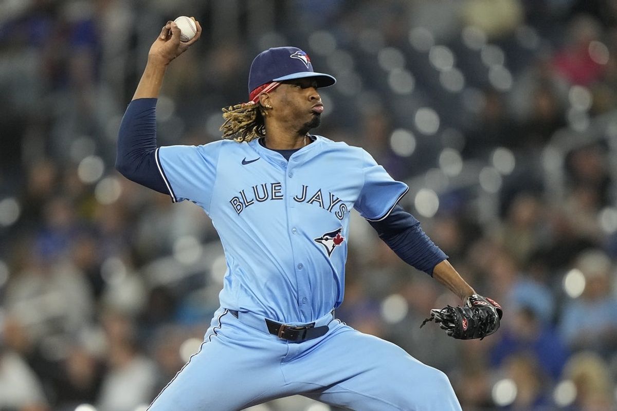 May 29, 2025; Toronto, Ontario, CAN; Toronto Blue Jays pitcher Jose Urena (48) pitches to the Athletics during the eighth inning at Rogers Centre. Mandatory Credit: John E. Sokolowski-Imagn Images