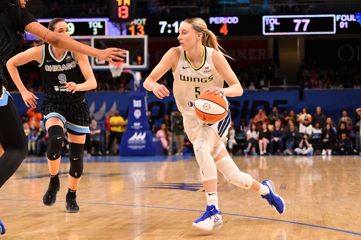 May 29, 2025; Chicago, Illinois, USA; Dallas Wings guard Paige Bueckers (5) controls the ball during the second half against the Chicago Sky at the Wintrust Arena. Mandatory Credit: Patrick Gorski-Imagn Images