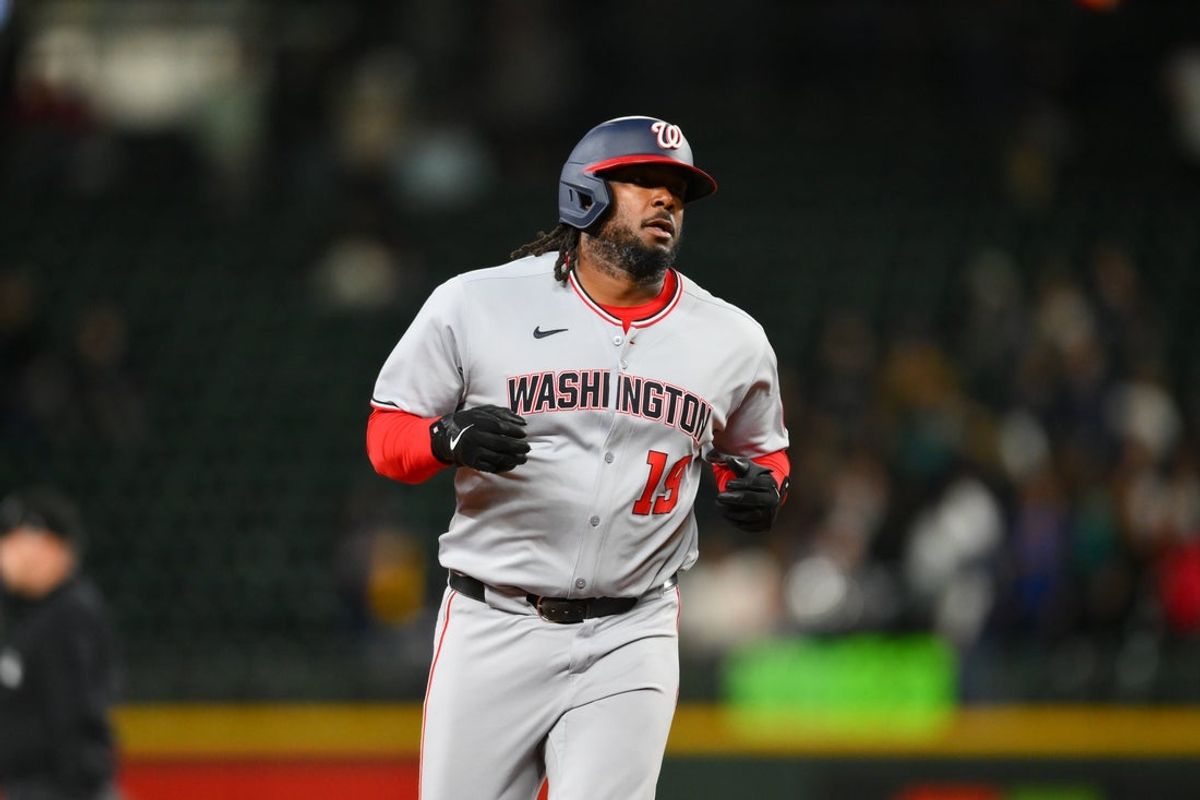 May 29, 2025; Seattle, Washington, USA; Washington Nationals designated hitter Josh Bell (19) runs the bases after hitting a 2-run home run against Seattle Mariners during the tenth inning at T-Mobile Park. Mandatory Credit: Steven Bisig-Imagn Images