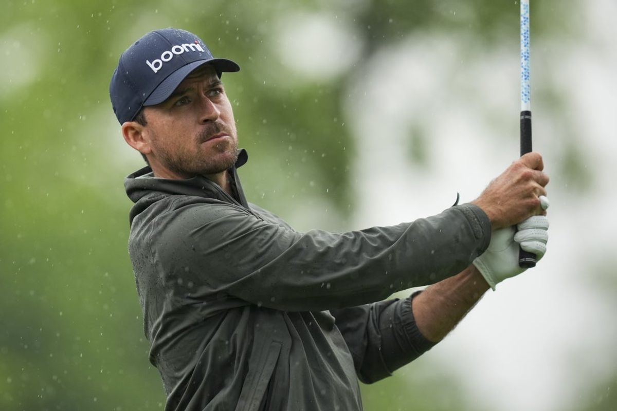 May 30, 2025; Dublin, Ohio, USA; Nick Taylor plays his shot from the 15th tee during the second round of the Memorial Tournament presented by Workday golf tournament. Mandatory Credit: Aaron Doster-Imagn Images
