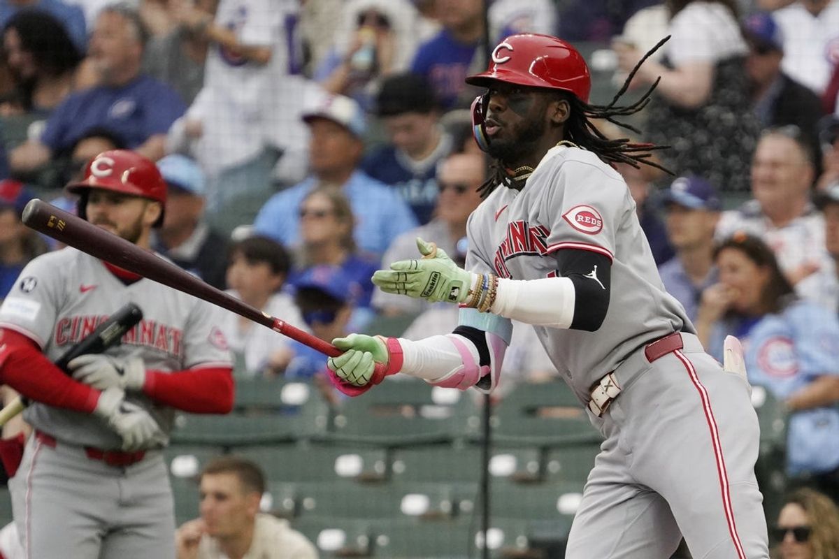 May 30, 2025; Chicago, Illinois, USA;Cincinnati Reds shortstop Elly De La Cruz (44) hits a double against the Chicago Cubs during the first inning at Wrigley Field. Mandatory Credit: David Banks-Imagn Images