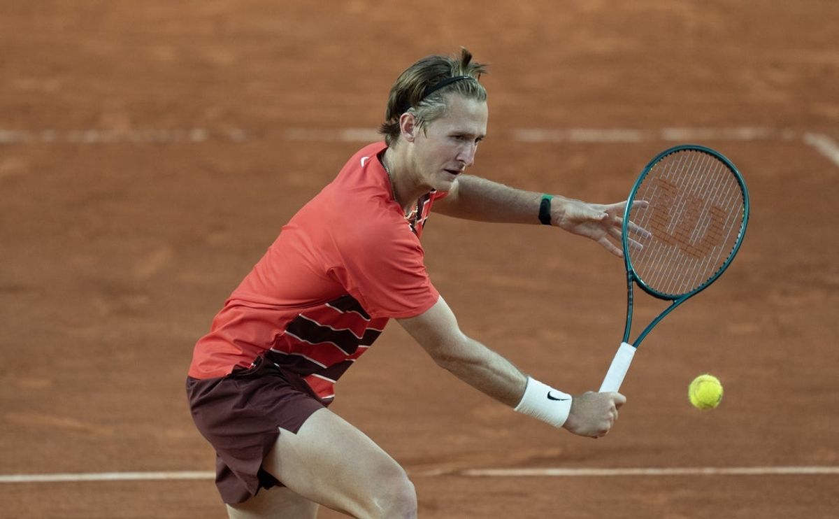 May 30, 2025; Paris, FR; Sebastian Korda of the United States returns a shot during his match against Frances Tiafoe of the United States on day six at Roland Garros Stadium.  Mandatory Credit: Susan Mullane-Imagn Images
