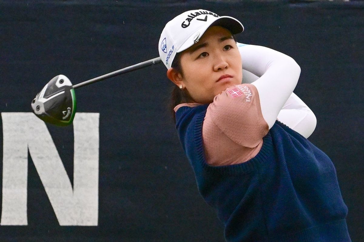 May 30, 2025; Erin, Wisconsin, USA; Rose Zhang tees off at the 1st hole during the second round of the U.S. Women's Open golf tournament. Mandatory Credit: Benny Sieu-Imagn Images