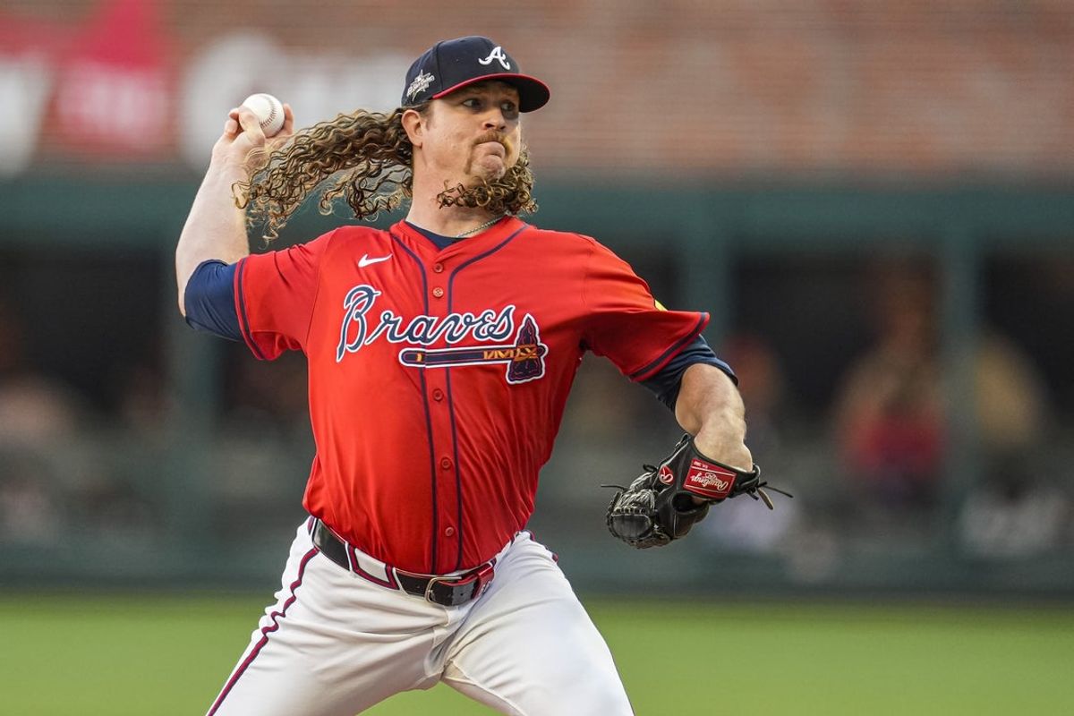 May 30, 2025; Cumberland, Georgia, USA; Atlanta Braves starting pitcher Grant Holmes (66) pitches against the Boston Red Sox during the first inning at Truist Park. Mandatory Credit: Dale Zanine-Imagn Images