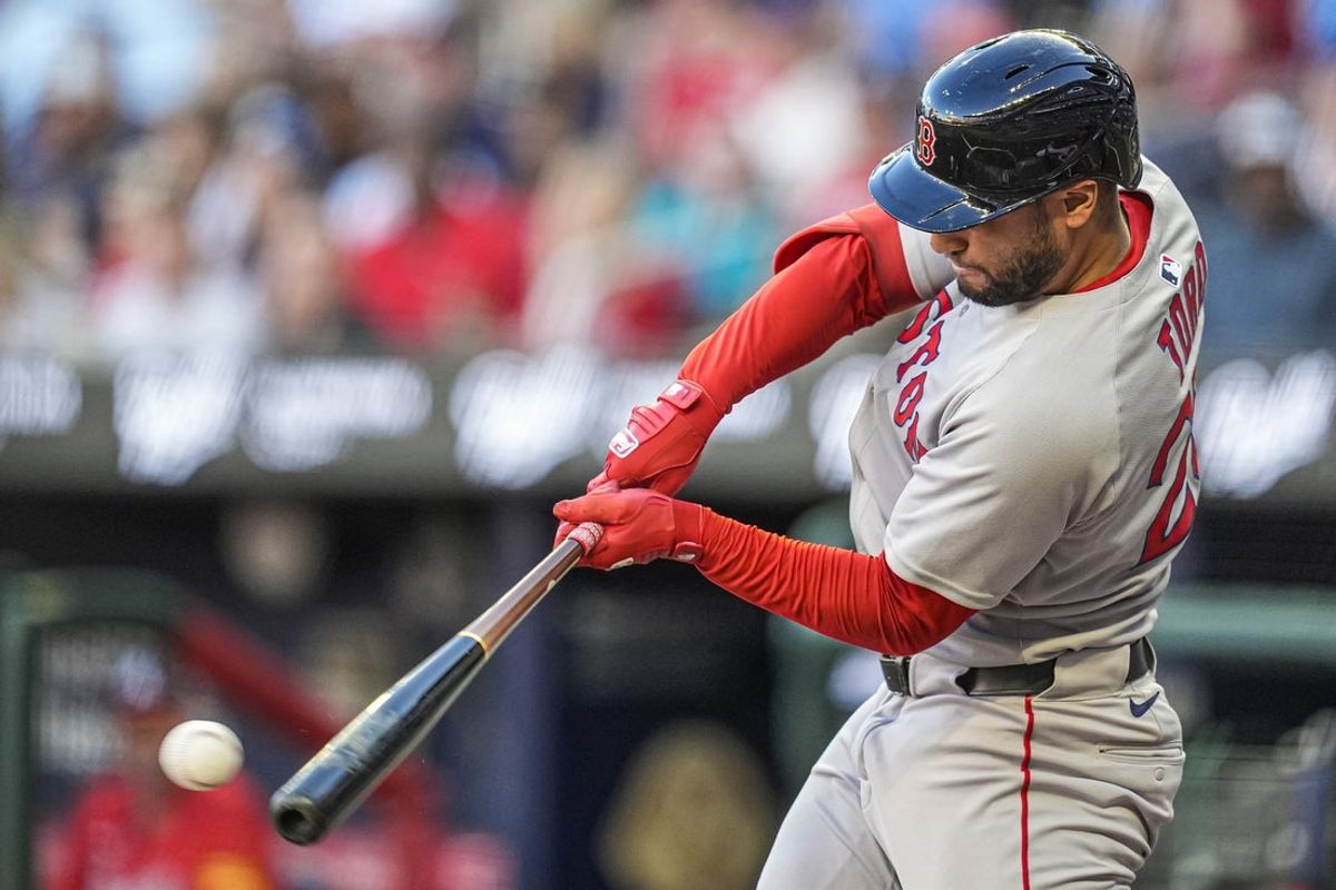 May 30, 2025; Cumberland, Georgia, USA; Boston Red Sox first baseman Abraham Toro (29) singles against the Atlanta Braves during the second inning at Truist Park. Mandatory Credit: Dale Zanine-Imagn Images