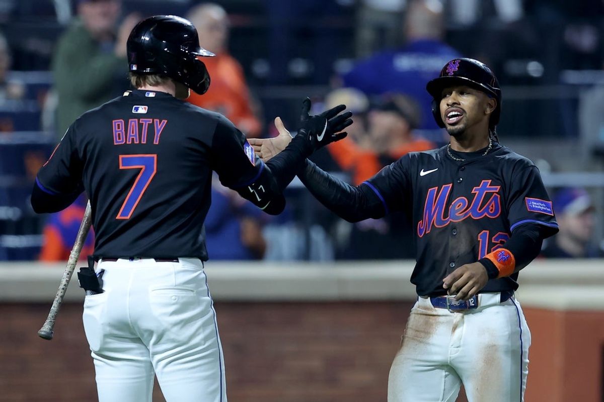 May 30, 2025; New York City, New York, USA; New York Mets shortstop Francisco Lindor (12) celebrates his solo home run against the Colorado Rockies with third baseman Brett Baty (7) during the eighth inning at Citi Field. Mandatory Credit: Brad Penner-Imagn Images