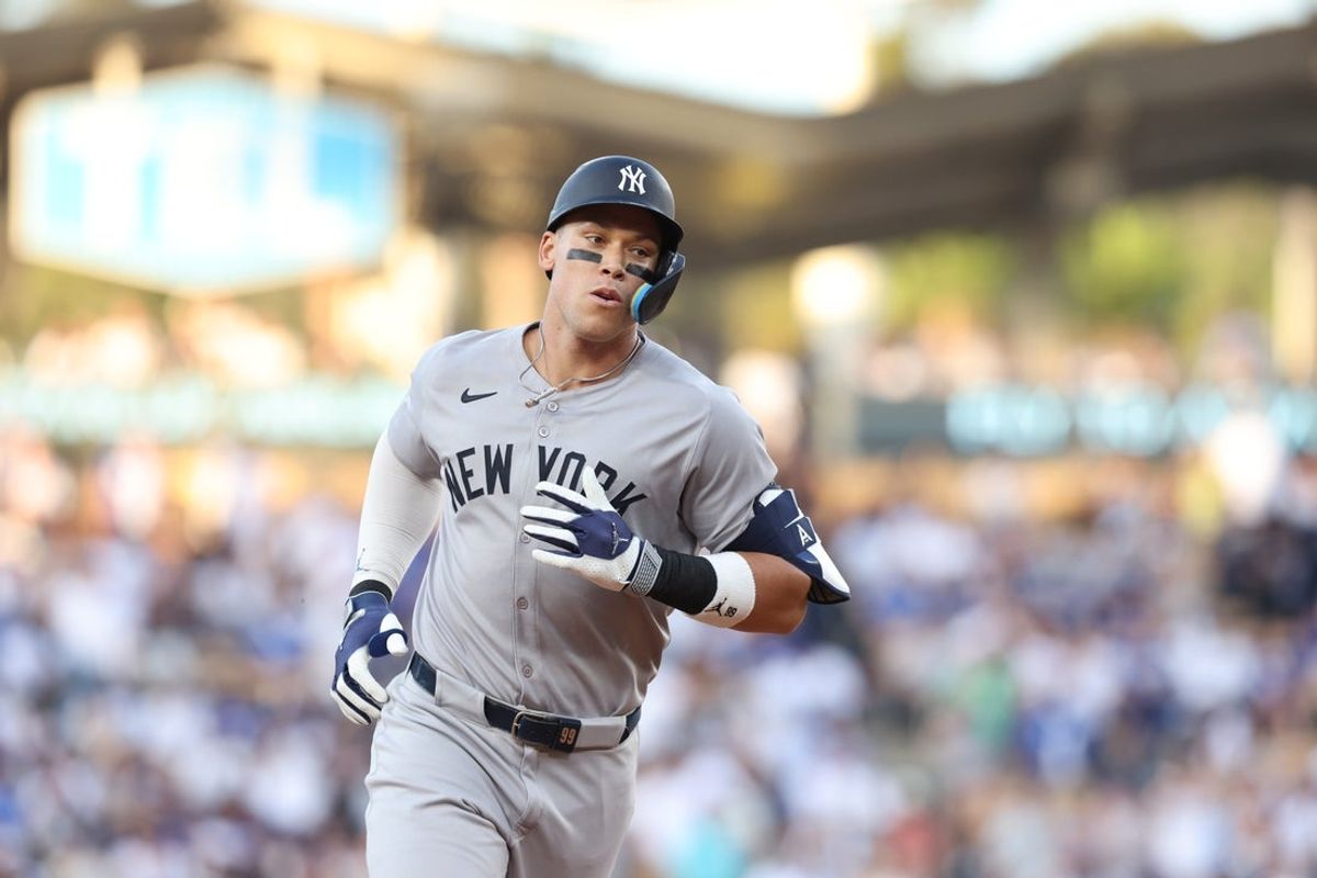 May 30, 2025; Los Angeles, California, USA; New York Yankees rightfielder Aaron Judge (99) rounds the bases after a home run during the first inning against the Los Angeles Dodgers at Dodger Stadium. Mandatory Credit: Jason Parkhurst-Imagn Images