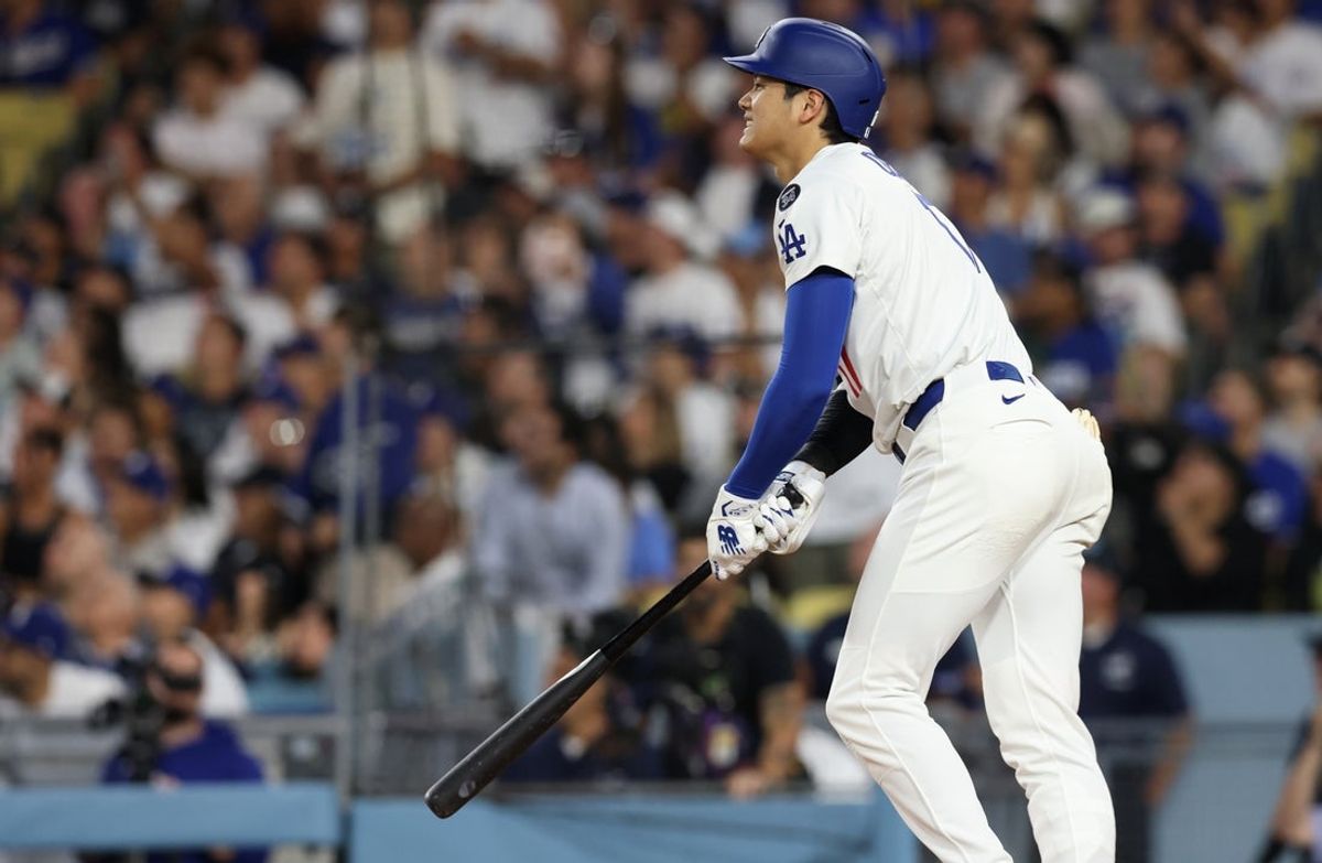May 30, 2025; Los Angeles, California, USA; Los Angeles Dodgers designated hitter Shohei Ohtani (17) watches a home run ball during the sixth inning against the New York Yankees at Dodger Stadium. Mandatory Credit: Jason Parkhurst-Imagn Images