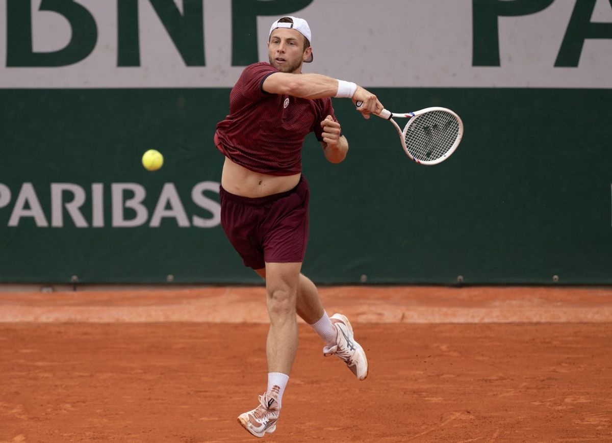 May 31, 2025; Paris, FR; Tallon Griekspoor of the Netherlands returns a shot during his match against Ethan Quinn of the United States on day seven at Roland Garros Stadium.  Mandatory Credit: Susan Mullane-Imagn Images