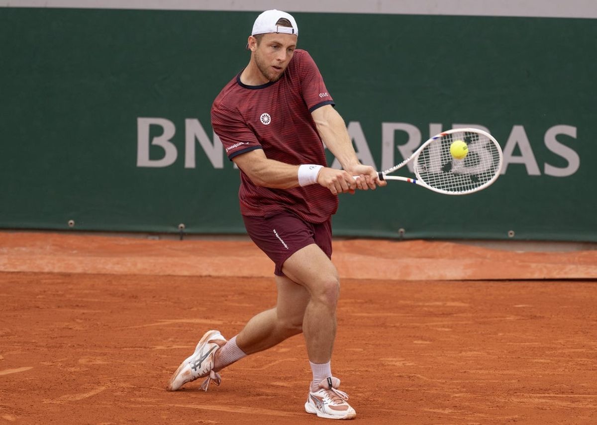 May 31, 2025; Paris, FR; Tallon Griekspoor of the Netherlands returns a shot during his match against Ethan Quinn of the United States on day seven at Roland Garros Stadium.  Mandatory Credit: Susan Mullane-Imagn Images