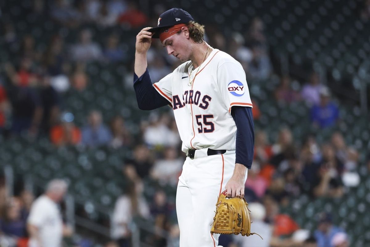 May 31, 2025; Houston, Texas, USA; Houston Astros relief pitcher Forrest Whitley (55) walks off the mound after pitching during the ninth inning against the Tampa Bay Rays at Daikin Park. Mandatory Credit: Troy Taormina-Imagn Images