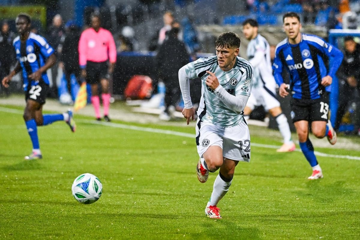 May 31, 2025; Montreal, Province of Quebec, CAN; New England Revolution defender Ilay Feingold (12) plays the ball against CF Montreal during the first half at Saputo Stadium. Mandatory Credit: David Kirouac-Imagn Images