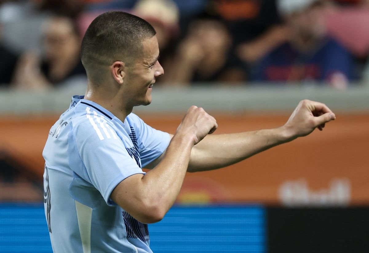 May 31, 2025; Houston, Texas, USA;  Sporting Kansas City forward Dejan Joveljic (9) celebrates his goal against the Houston Dynamo FC in the first half at Shell Energy Stadium. Mandatory Credit: Thomas Shea-Imagn Images