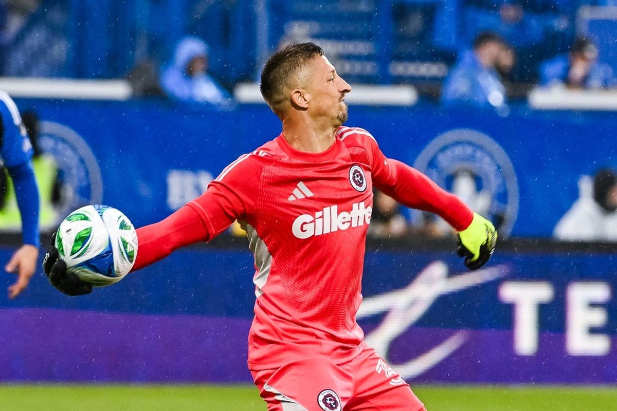May 31, 2025; Montreal, Province of Quebec, CAN; New England Revolution goalkeeper Aljaz Ivacic (31) throws the ball back into play against CF Montreal during the first half at Saputo Stadium. Mandatory Credit: David Kirouac-Imagn Images