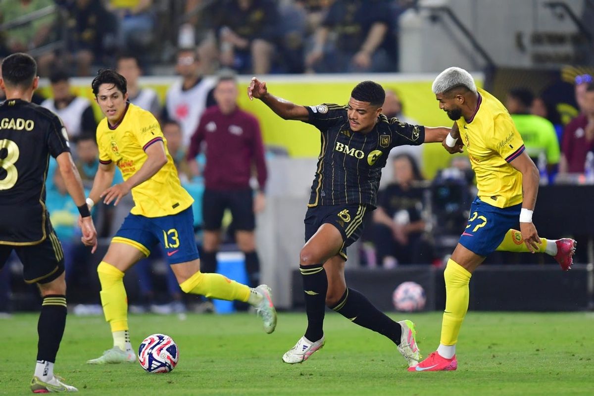 May 31, 2025; Los Angeles, California, USA; Club America forward Rodrigo Aguirre (27) and midfielder Alan Cervantes (13) battle for the ball against LAFC midfielder Igor Jesus (6) in the first half during a playoff match of the 2025 FIFA Club World Cup at BMO Stadium. Mandatory Credit: Gary A. Vasquez-Imagn Images
