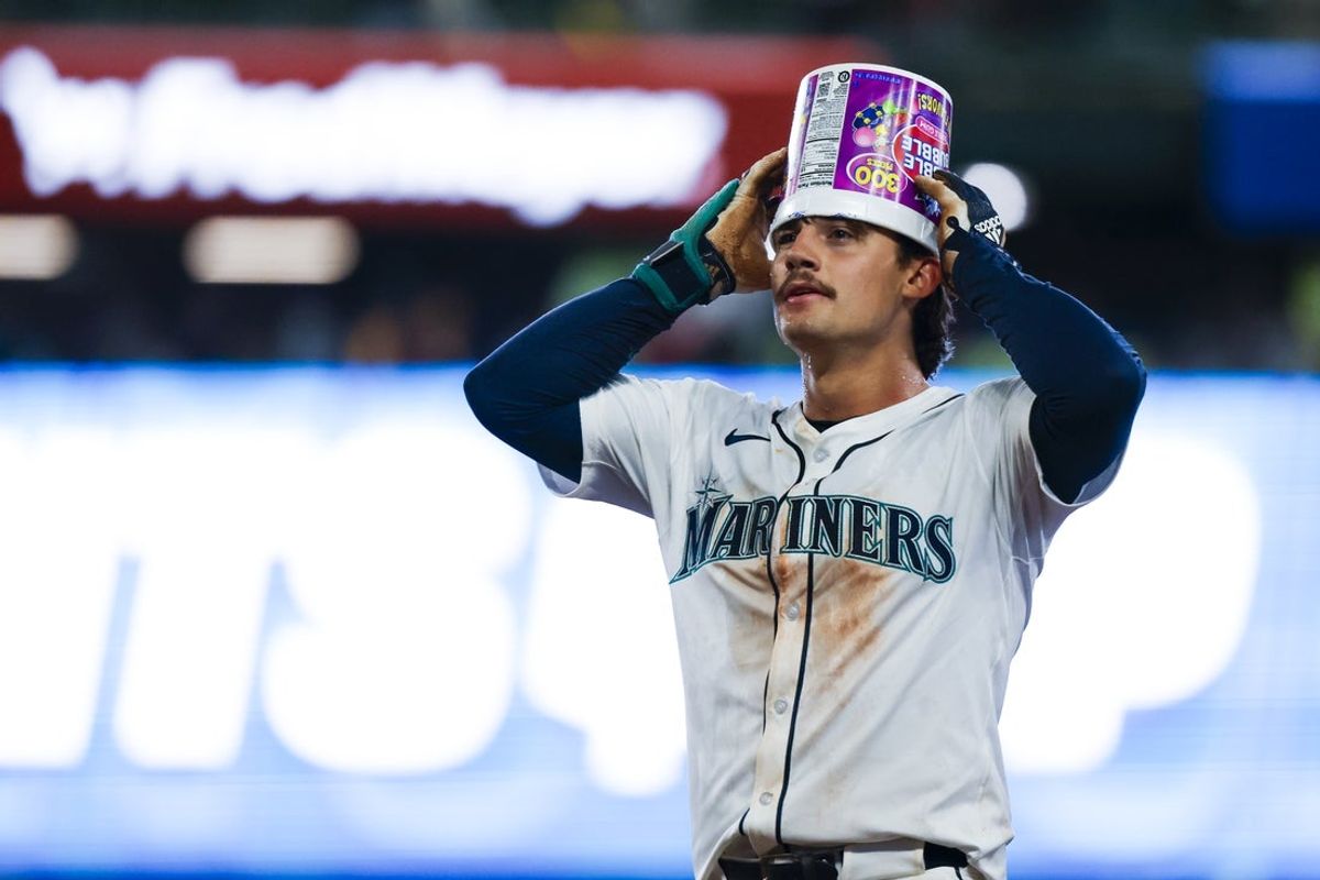 May 31, 2025; Seattle, Washington, USA; Seattle Mariners second baseman Cole Young (2) walks to the dugout following a walk-off RBI-fielders choice against the Minnesota Twins during the eleventh inning at T-Mobile Park. Mandatory Credit: Joe Nicholson-Imagn Images