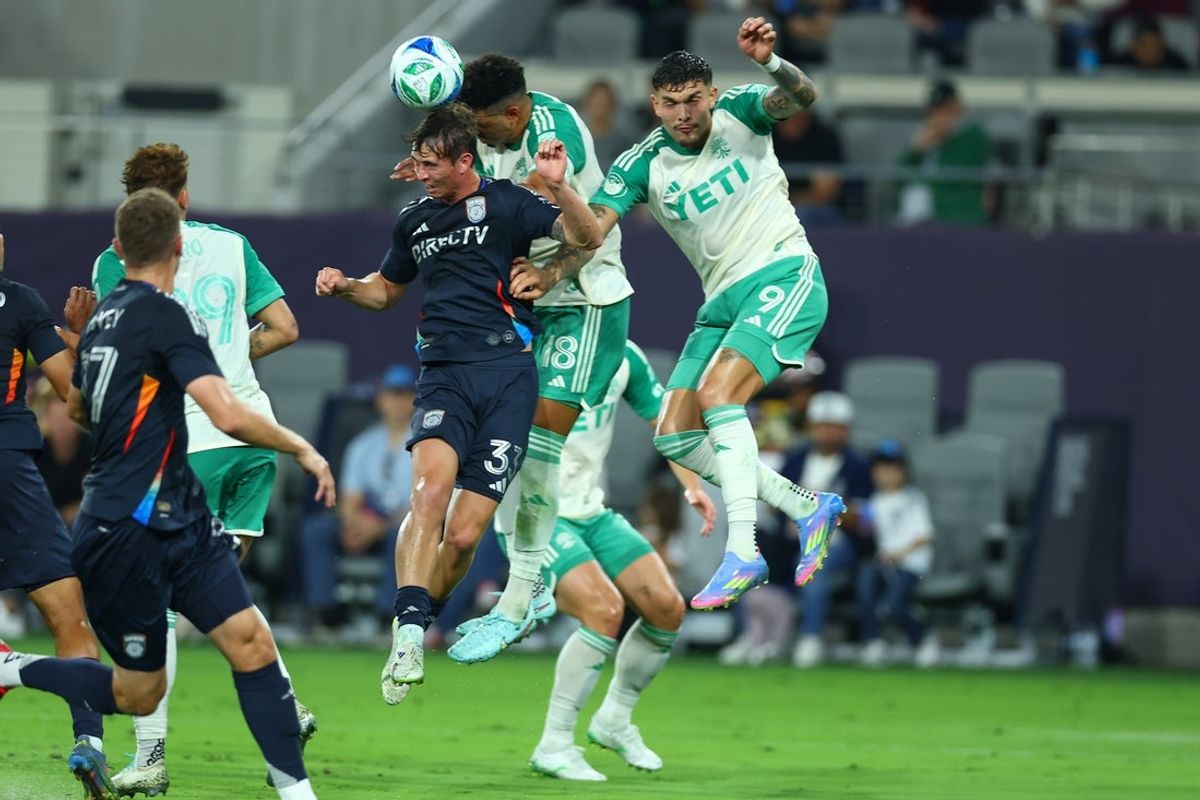 May 31, 2025; San Diego, California, USA; San Diego FC defender Oscar Verhoeven (33) heads the ball away from Austin FC defender Julio Cascante (18) and forward Brandon Vazquez (9) during the first half at Snapdragon Stadium. Mandatory Credit: Chadd Cady-Imagn Images