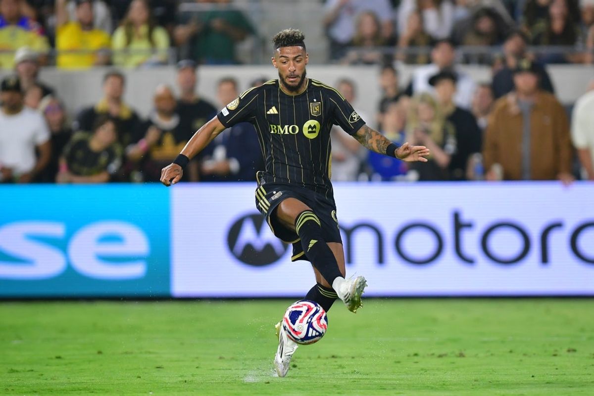 May 31, 2025; Los Angeles, California, USA; LAFC forward Denis Bouanga (99) shoots against Club America in the second half during a playoff match of the 2025 FIFA Club World Cup at BMO Stadium. Mandatory Credit: Gary A. Vasquez-Imagn Images